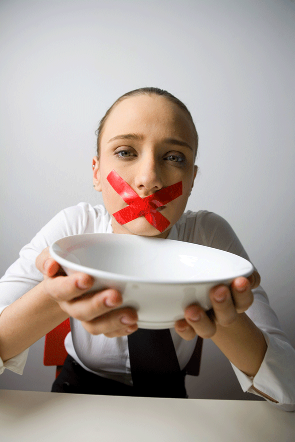 Woman with mouth gagged / Foto: Shutterstock