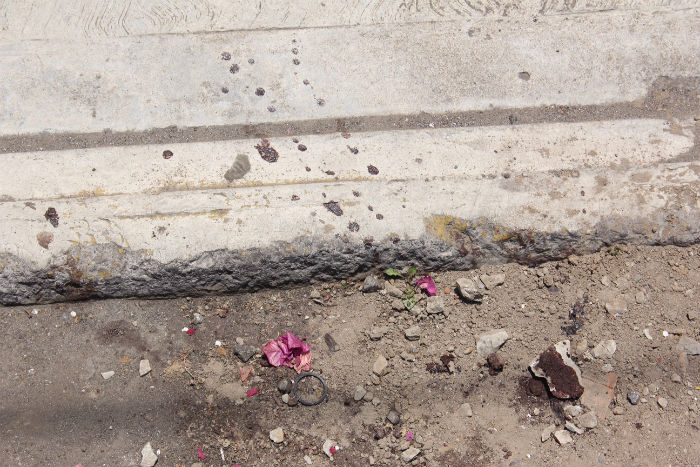 En la calle N. Morones del barrio de Santiago Mizquitla quedo el cuerpo del joven Ricardo Cadena Becerra, tras recibir un disparo en la cabeza. Foto: Luis Barrón, Cuartoscuro