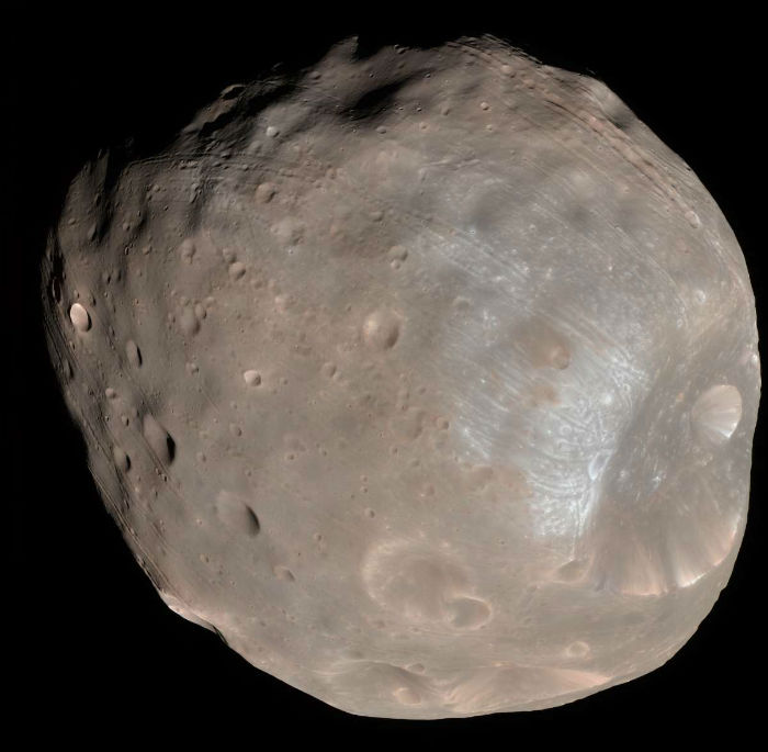 La cercanía de las lunas marcianas con el Planeta Rojo puede servir para fines de exploración dentro de dos décadas. Foto: NASA, JPL-Caltech, University of Arizona