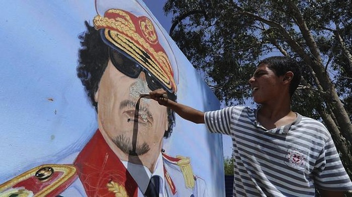 Gobiernos autoritarios como el de Muamar Gadaffi se encuentran entre los clientes de Hacking Team. Foto: EFE