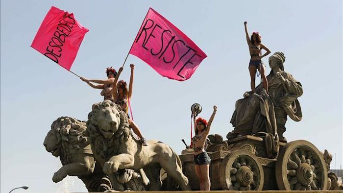 La protesta de Femen el da que entra en vigor la Ley Mordaza. Foto: EFE