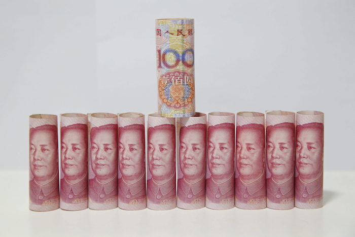 El banco central chino devalúa un 1.11 por ciento tipo de cambio de referencia de yuan. Foto: EFE