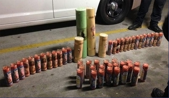 Veladoras con imágenes de santos católicos, rellenas de metanfetamina. Foto: DEA