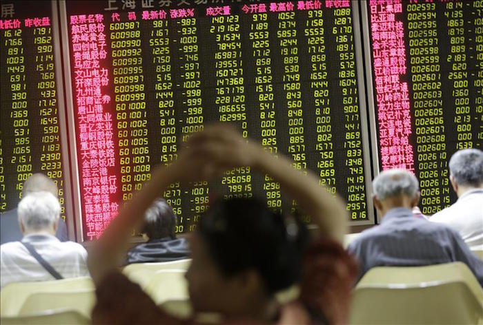 Por segunda vez en su historia, las bolsas chinas cerraron su sesión. Foto: EFE