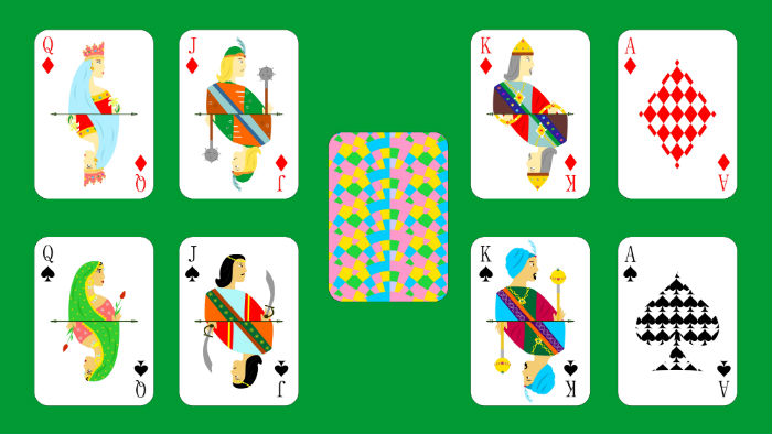 Juego al solitario. Encima de las cartas negras acomodo las rojas. A un siete le sigue un seis. Una reina de corazones negros tapa a un rey de diamantes y luego un bandido montado a caballo la oculta. Foto: Shutterstock