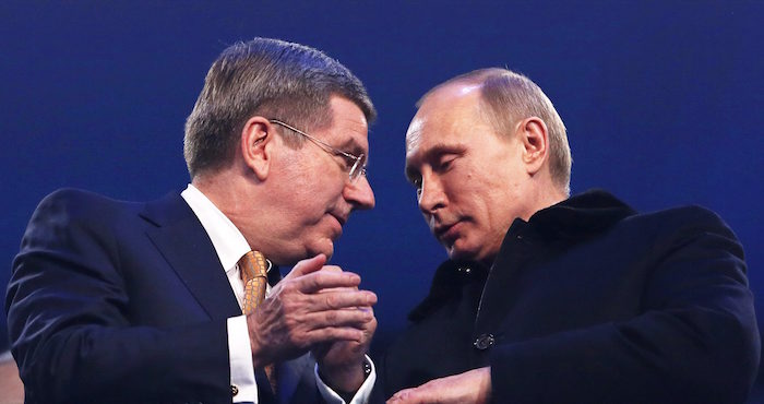 Thomas Bach, presidente del COI, y Vladimir Putin, presidente de Rusia. Foto EFE
