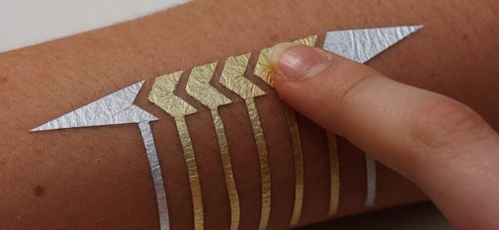 Cada tatuaje temporal está compuesto de tres capas: una que funciona como entrada de comandos, convirtiendo la piel en un trackpad plenamente funcional. Foto:
