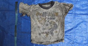 La imagen de la Fiscalía de Veracruz confirma el hallazgo de la ropa de niños en las fosas. Foto de la Fiscalía vía AP