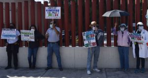 Protesta contra la extinción de los fideicomisos en la Cámara de Diputados.