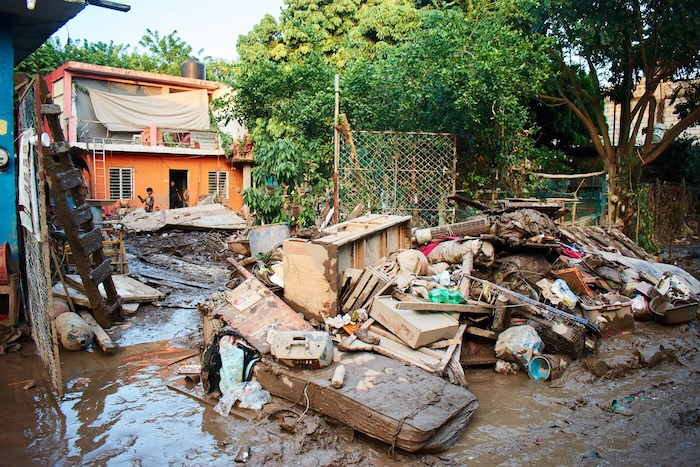 Diana se puso a salvo gracias a que fue alertada de la crecida del río Cazones cuando regresó a su casa, después de salir a buscar al perro que se le escapó.