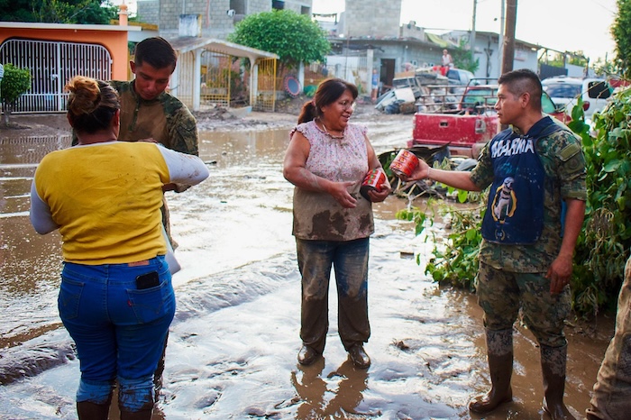 Diana se puso a salvo gracias a que fue alertada de la crecida del río Cazones cuando regresó a su casa, después de salir a buscar al perro que se le escapó.