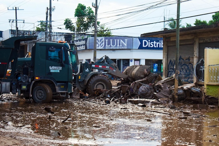Diana se puso a salvo gracias a que fue alertada de la crecida del río Cazones cuando regresó a su casa, después de salir a buscar al perro que se le escapó.
