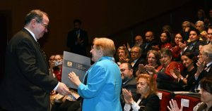 Rector of UNAM gives awards to university students.